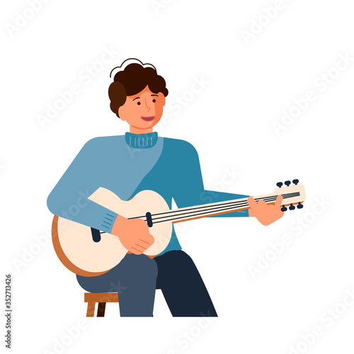 Folk singer is playing guitar