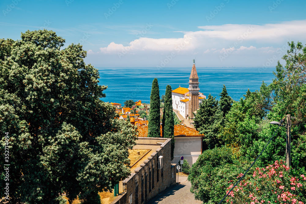 St. George's Parish Church and old town and Adriatic sea in Piran, Slovenia