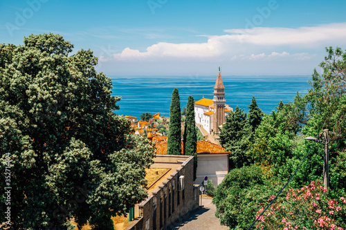 Obraz na płótnie St. George's Parish Church and old town and Adriatic sea in Piran, Slovenia w salonie