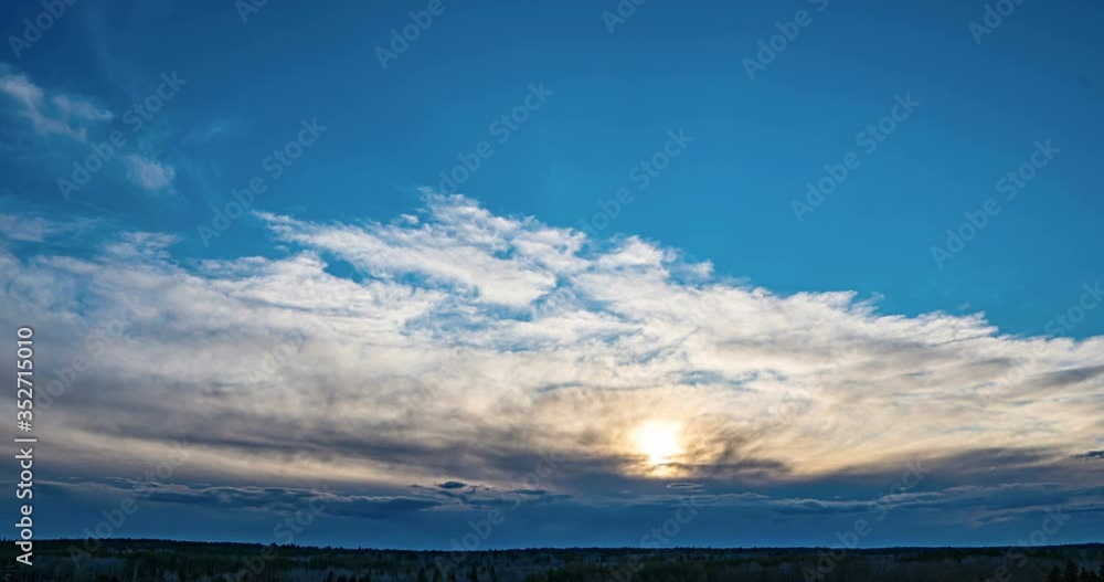 Aerial scene of high panoramic view at sunset. Beautiful clouds blue sky, sun glow cloud, background Sky, 4K, the sun shines through the clouds at sunset Aerial scene of high panoramic view at sunset. Beautiful clouds blue sky, sun glow cloud, background Sky, 4K, the sun shines through the clouds at sunset