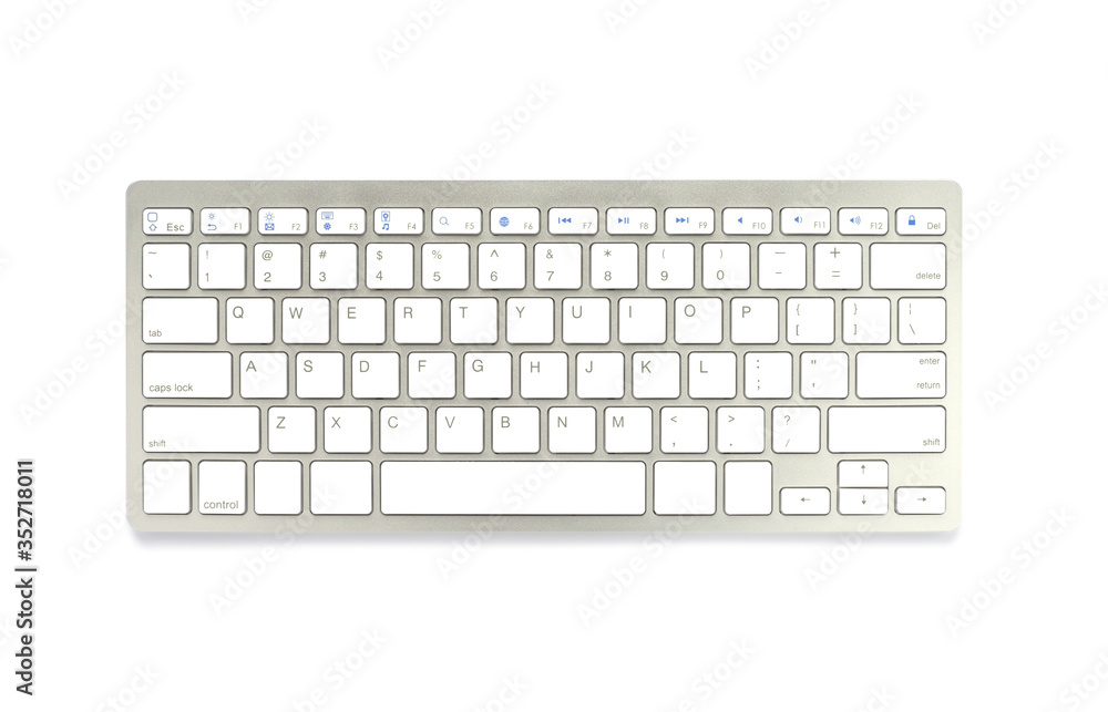 Modern computer keyboard isolated on white background with clipping path. material made from aluminum and plastic. It is an electronic device used for business and internet communication. Modern computer keyboard isolated on white background with clipping path. material made from aluminum and plastic. It is an electronic device used for business and internet communication.