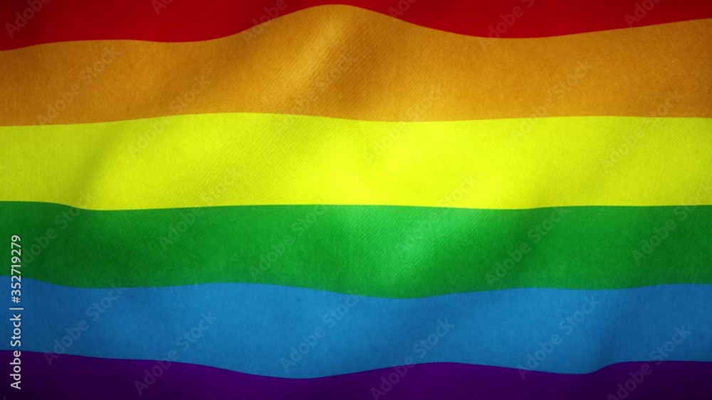 Rainbow pride flag of LGBT movement waving in the wind Rainbow pride flag of LGBT movement waving in the wind