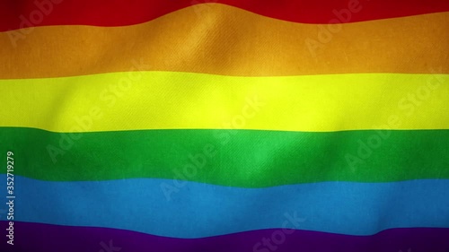 Rainbow pride flag of LGBT movement waving in the wind