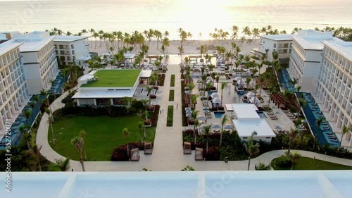 AERIAL Reveal, Luxury Beachfront Tropical Resort With Ocean Sunrise photo