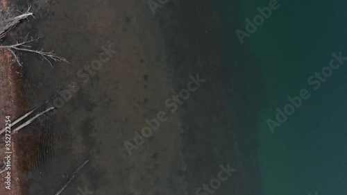 Turquoise shallow waters of flathead lake of Kalispell Montana photo