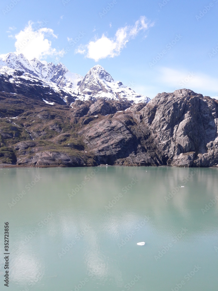 Alaska glacier, lake, canal, mountains and snow with a clear blue sky on a sunny spring day 2018 Alaska glacier, lake, canal, mountains and snow with a clear blue sky on a sunny spring day 2018