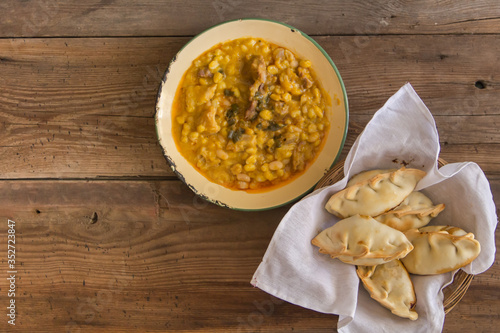 locro dishes and empanadas, traditional Argentine foods that are frequently consumed for national holidays, such as the revolution of May 25 and independence on July 9 photo