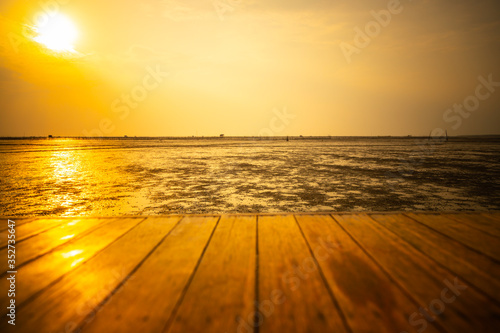 The wood floor extends into the sea when the water drops