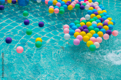 Colorful balls in the swimming pool