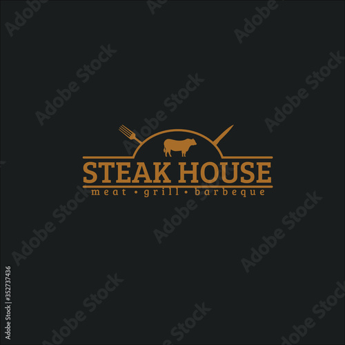 Steak house text with fork, knife and cow silhouette isolated on dark background fit for steak restaurant logo