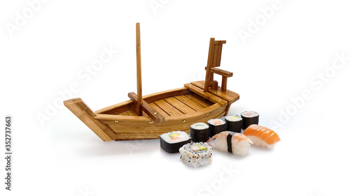 Flying sushi set table ship japan food sashimi salmon tuna rice delicious