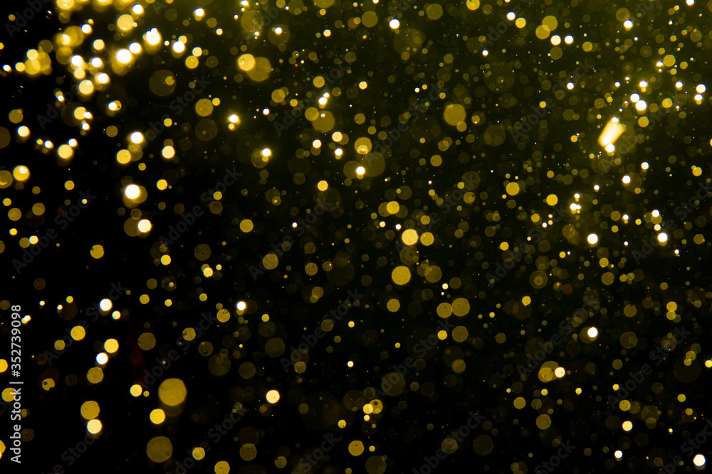 Golden blur glitter lights abstract bokeh for Merry Christmas and New Year Golden blur glitter lights abstract bokeh for Merry Christmas and New Year
