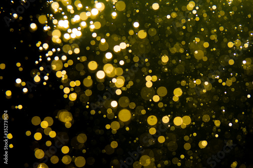 Golden blur glitter  lights abstract bokeh for Merry Christmas and New Year