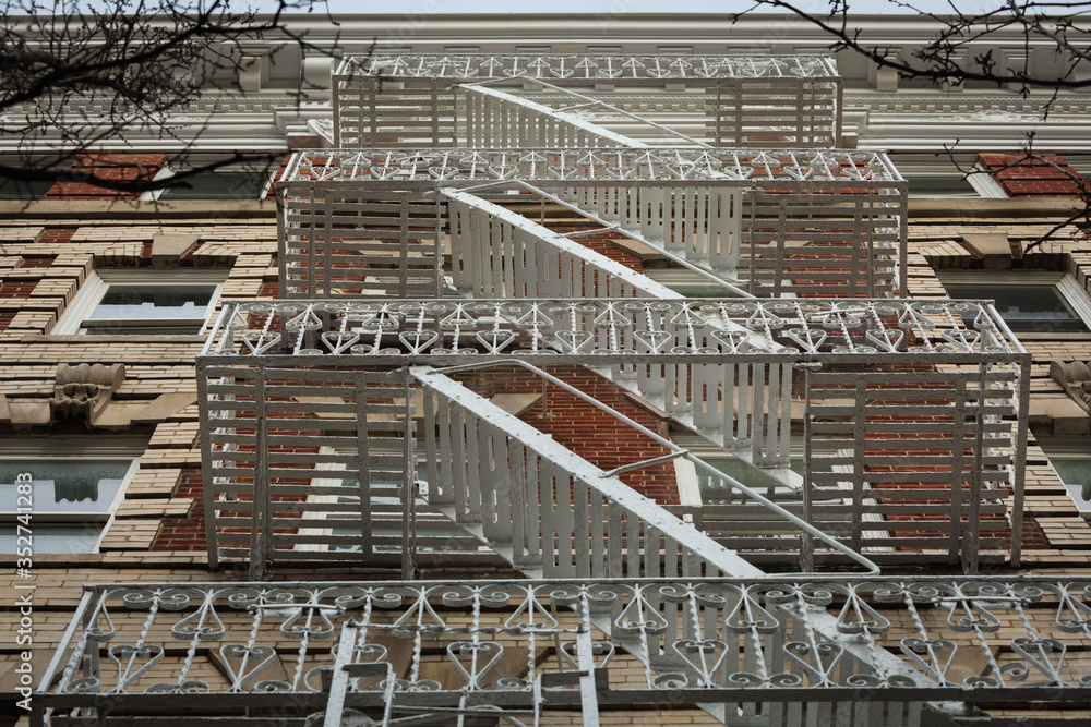 Facades with typical Fires Escape Stairs in New York City