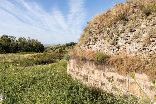 The ruins  of the fortress wall of the Ateret fortress - Metzad Ateret - Qasr Atara - located next to the Gesher Benot Ya'akov bridge on the Jordan River, in northern Israel
 photo