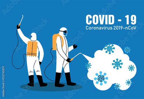men with biosecurity suit for disinfection of covid-19 photo