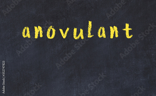 Foto Black chalkboard with inscription anovulant on in