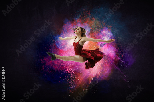 Female dancer against colourful background