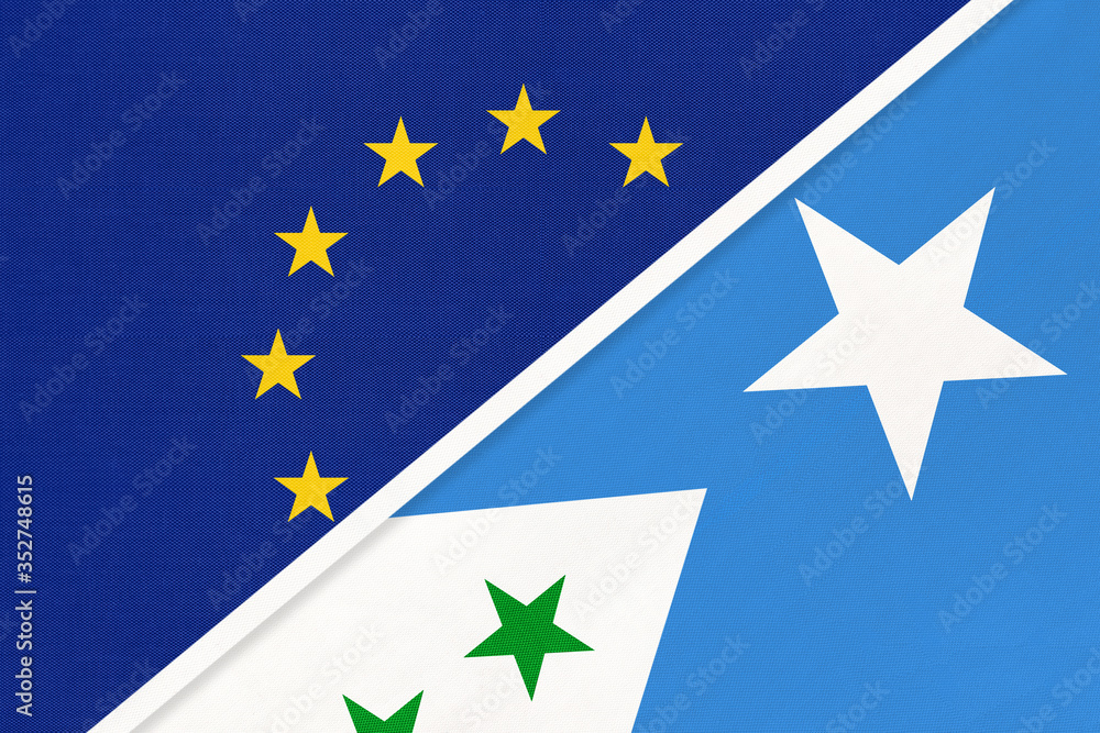 European Union or EU and Galmudug national flag from textile. Symbol of the Council of Europe association. European Union or EU and Galmudug national flag from textile. Symbol of the Council of Europe association.