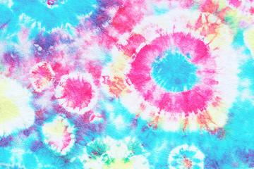 tie dye pattern hand dyed on cotton fabric abstract texture background.
