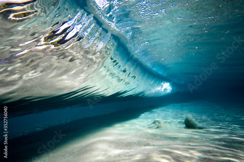 Fototapeta Naklejka Na Ścianę i Meble -  underneath a crashing wave