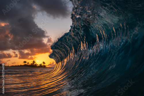 wave crashing at sunrise