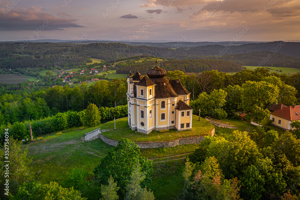 Fototapeta premium Poppy Mountain is a peak in the Benesov Hills and an important place of pilgrimage. Baroque church of St. John the Baptist and the Virgin Mary of Carmel was built between 1719 and 1722.