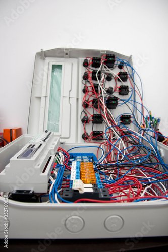 Assembly of automatic control panel. Information technology. Technology electrotechnical design. Engineering, futuristic, science communication concept. Digital technology background. Vertical image