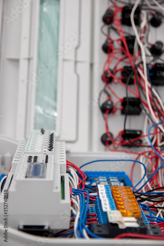 Assembly of automatic control panel. Information technology. Technology electrotechnical design. Engineering, futuristic, science communication concept. Digital technology background. Vertical image