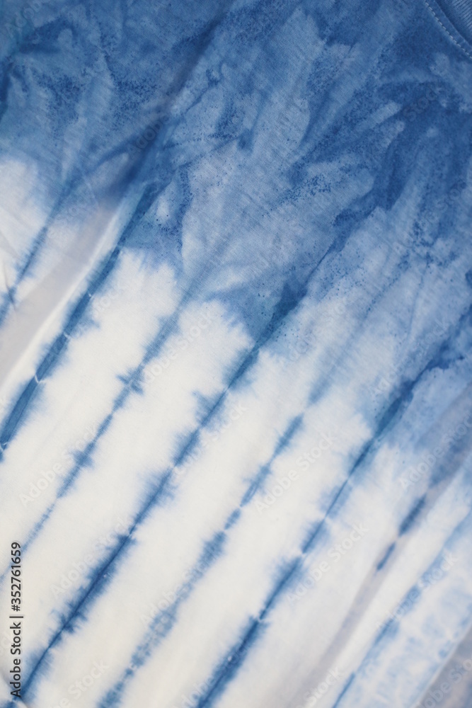 Naklejka premium tie dye abstract blue background from nature.