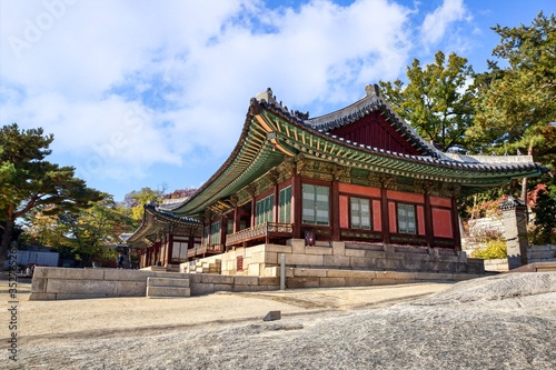 Clouds fill the sky in the backdrop of this artistic building of the Changgyonggung Palace.