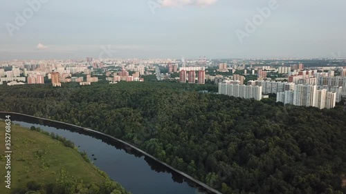 Wallpaper Mural 4K quality aerial video scenic view of Grebnoi rowing channel, green park, distant city and hills in Krylatskoye area on cloudy afternoon near Moscow River in Moscow, Russia Torontodigital.ca