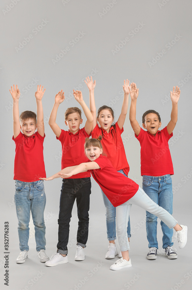 Cute little dancers on grey background Cute little dancers on grey background
