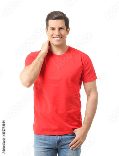 Man in stylish t-shirt on w...