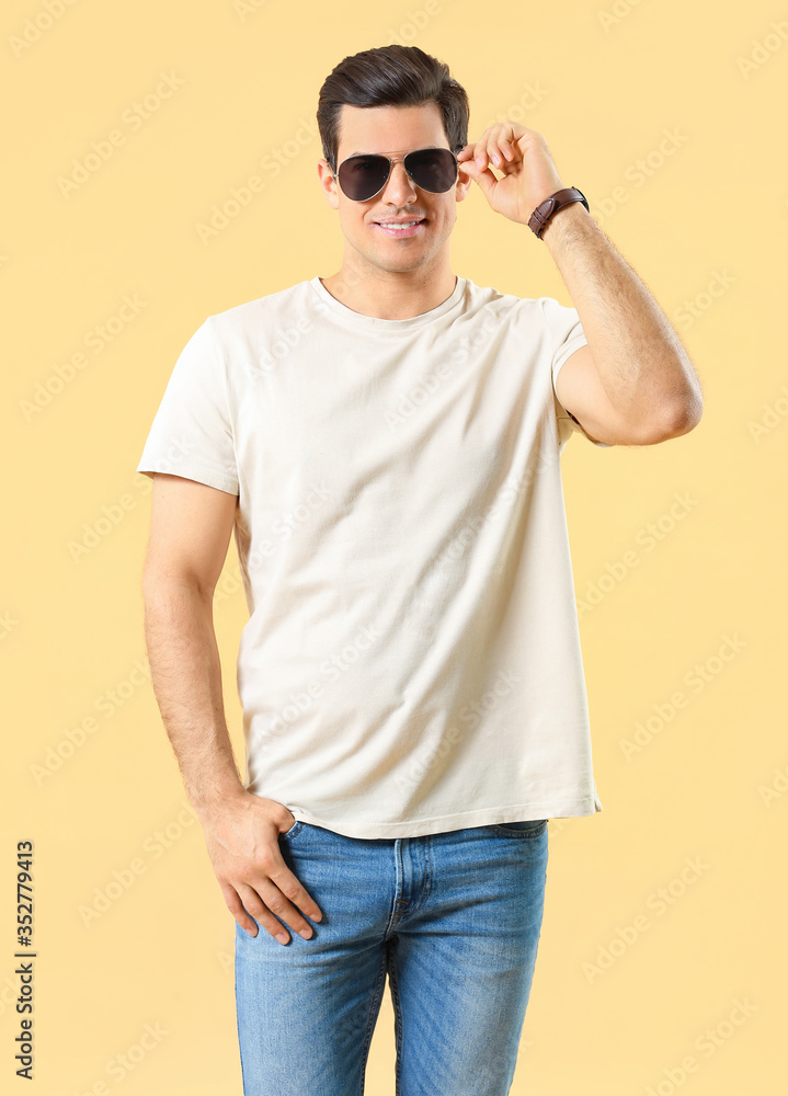 Man in stylish t-shirt on color background Man in stylish t-shirt on color background