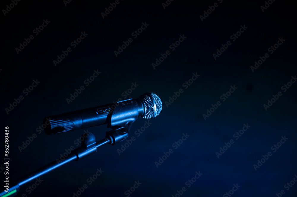 .Wireless microphone with dark background .Wireless microphone with dark background