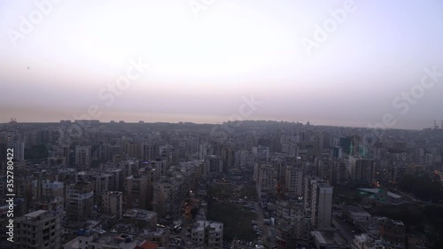Time lapse: urban city skyline view of buildings from day to night, Tripoli, Lebanon