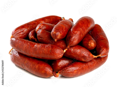 .Tied chorizo on white background