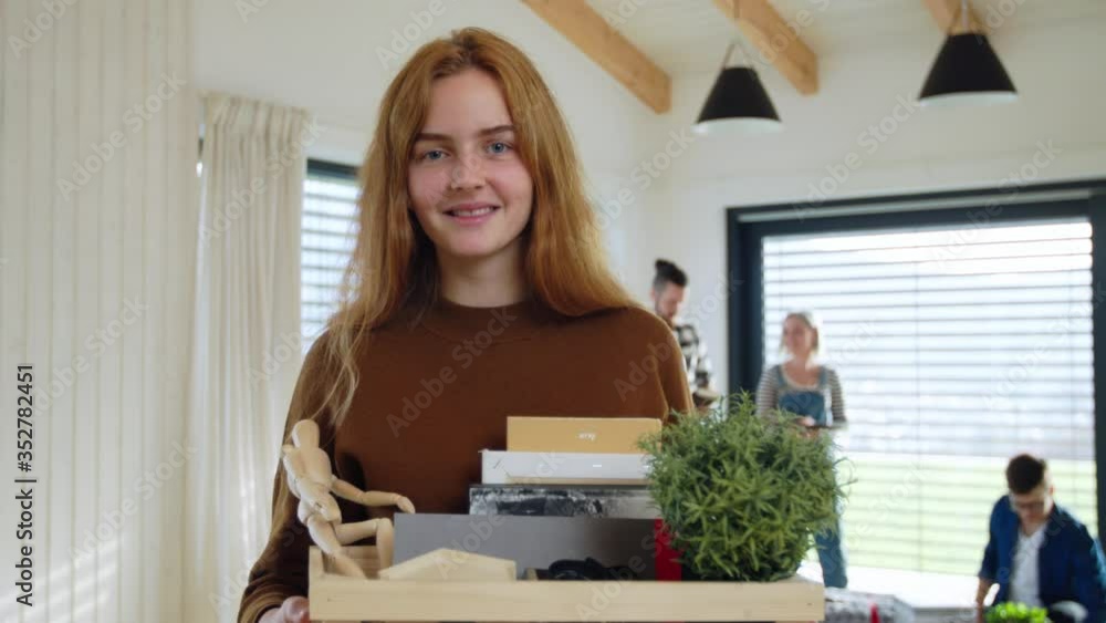 Group of young people moving in new home, house sharing concept. Group of young people moving in new home, house sharing concept.