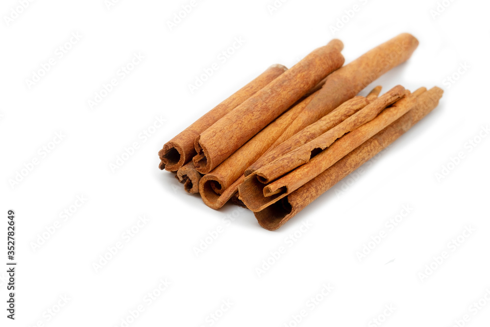Cinnamon sticks isolated on white background. Cinnamon sticks isolated on white background.