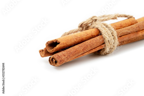 Cinnamon sticks isolated on white background.