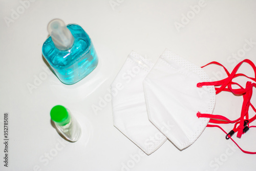 Corona virus prevention surgical masks, and hand sanitizer gel, liquid handwash soap for hand hygiene spread protection. 