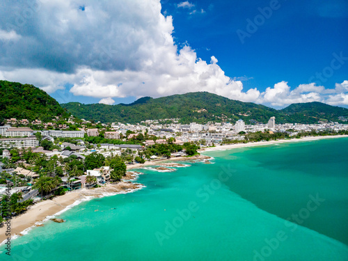 Aerial view of quiet beautiful sunny day Patong beach in Phuket Thailand during locked down policy due to Covid-19. All beaches in Phuket are not allowed to enter.