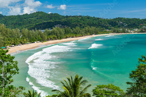 Beautiful view of quiet sunny day at famous Kamala beach in Phuket Thailand during locked down policy due to Covid-19. All beaches in Phuket are not allowed to enter.