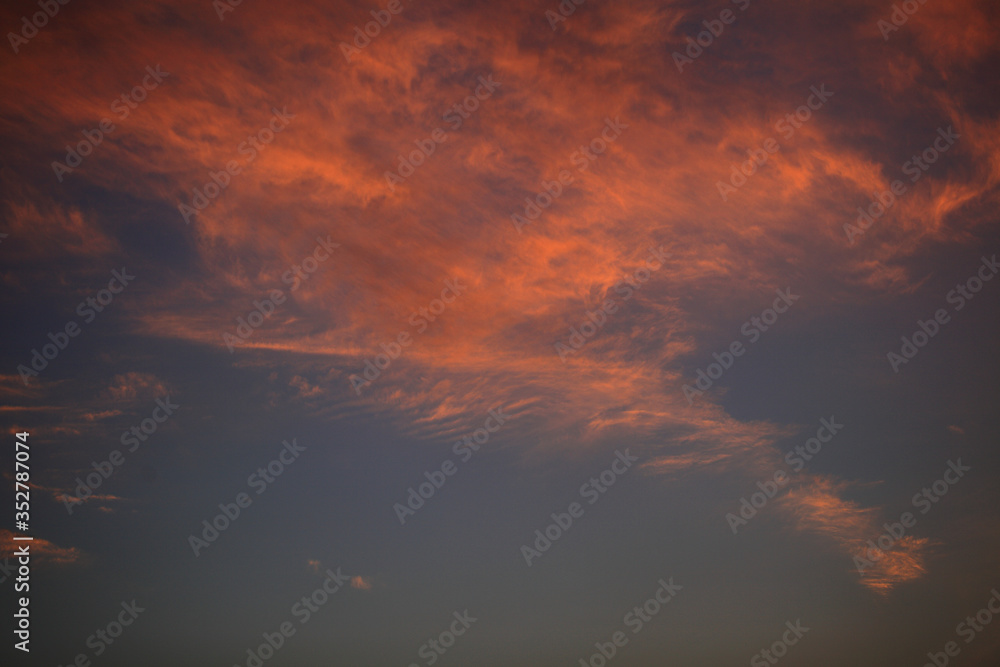 Fototapeta premium The vast blue sky and red clouds. Blue sky panorama.