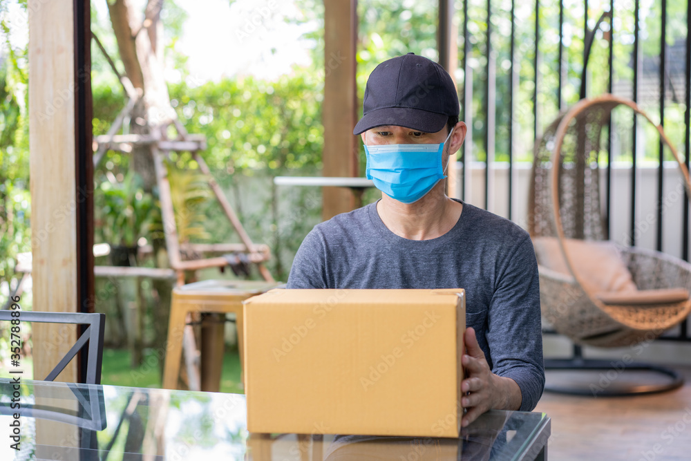 Safety mail goods delivering during epidemic. .Online shopping order under quarantine coronavirus covid-19.