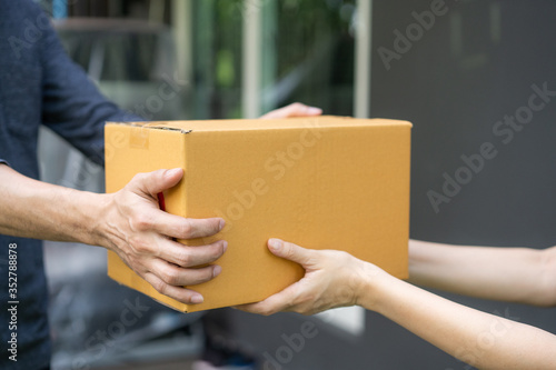 Safety mail goods delivering during epidemic. .Online shopping order under quarantine coronavirus covid-19.