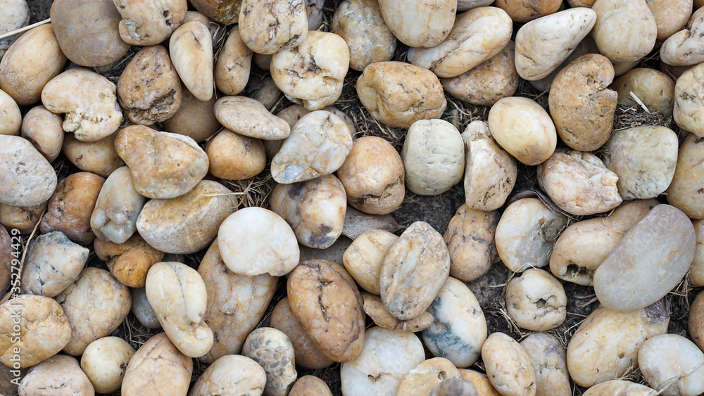 The walls made of many small stones were arranged artistically. Suitable for use as background images. The walls made of many small stones were arranged artistically. Suitable for use as background images.