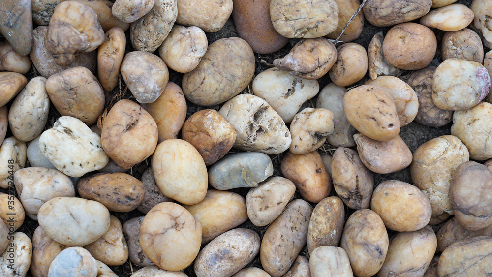 The walls made of many small stones were arranged artistically. Suitable for use as background images. The walls made of many small stones were arranged artistically. Suitable for use as background images.
