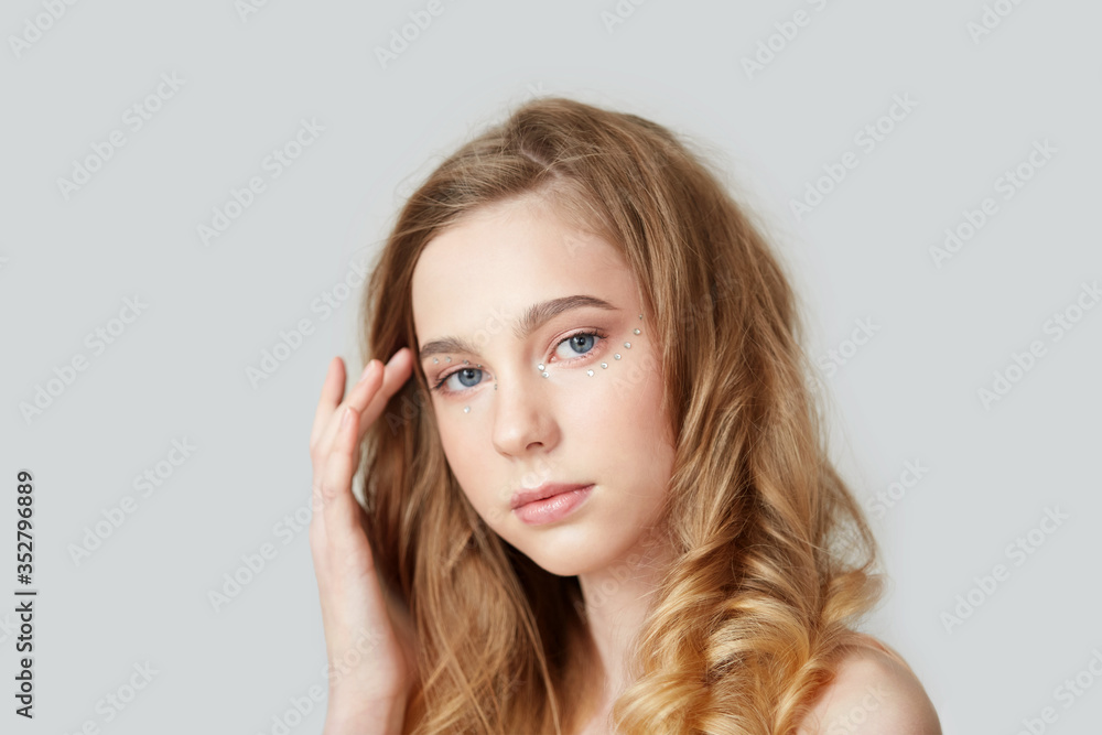 Beautiful woman with magnificent blond hair. Shiny long health hairstyle. Beautiful woman with magnificent blond hair. Shiny long health hairstyle.